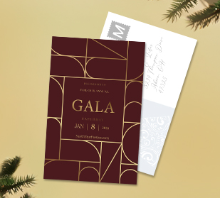 front of and back of postcards on table