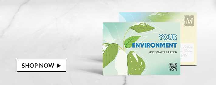 front of and back of postcards on table